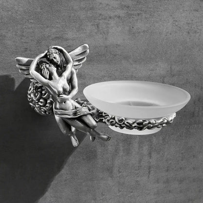 Silver-toned angel and nymph figurine holding a frosted glass soap dish in romantic bathroom hardware set