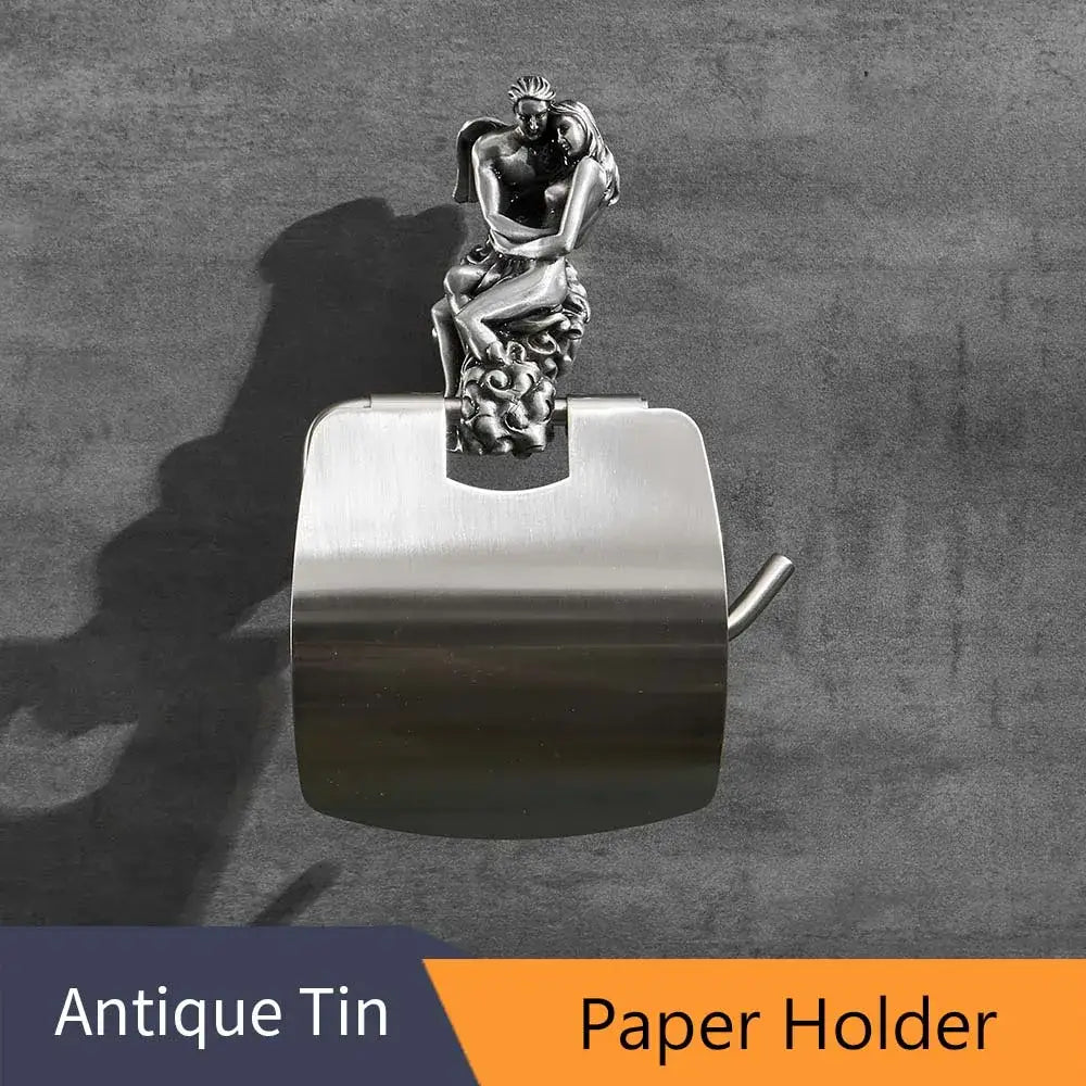 Silver-toned toilet paper holder with ornate romantic couple sculpture, part of romantic silver angel bathroom hardware set