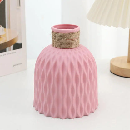 Pink ceramic rope vase with textured wavy surface and natural twine wrap for living room flower arrangement decor
