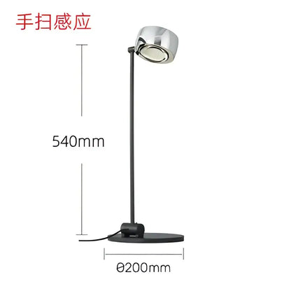 A sleek modern decorbites designer fishing floor lamp with polished chrome head and black metal base for living room decor