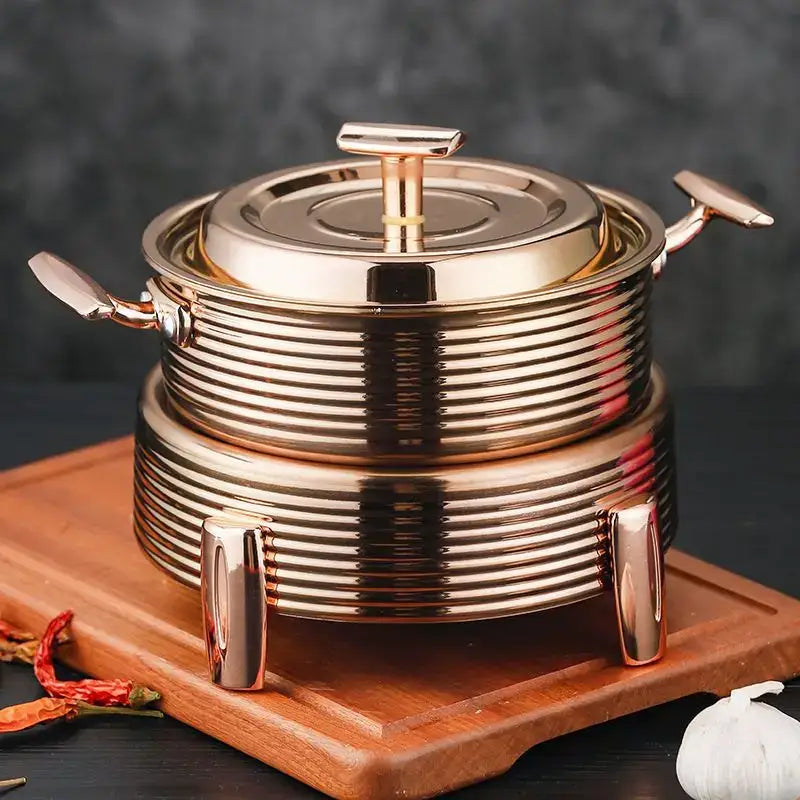 Rose gold stainless steel double-tiered hot pot with ribbed sides and handles for hot pot alcohol set dining use