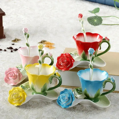 Set of four colorful ceramic rose peony floral teacups with matching saucers and ornate spoons for dining room