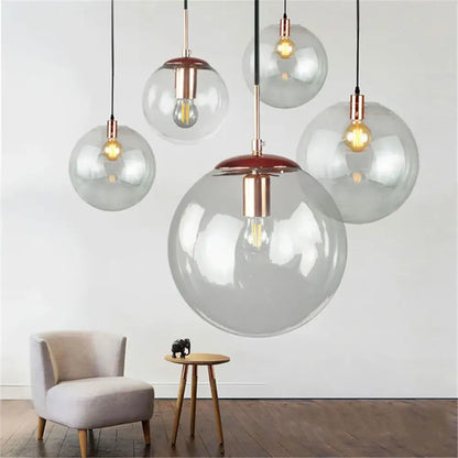 Round clear glass lamp shade replacement with copper accents and warm filament bulbs for living room decorbites clear glass