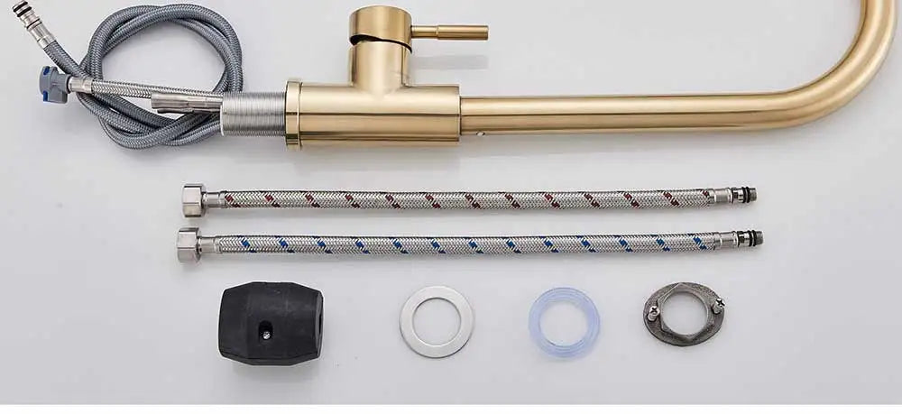 Gold-toned Rozin chrome deck mounted single hole kitchen mixer tap with sleek curved spout and pull out sprayer nozzle