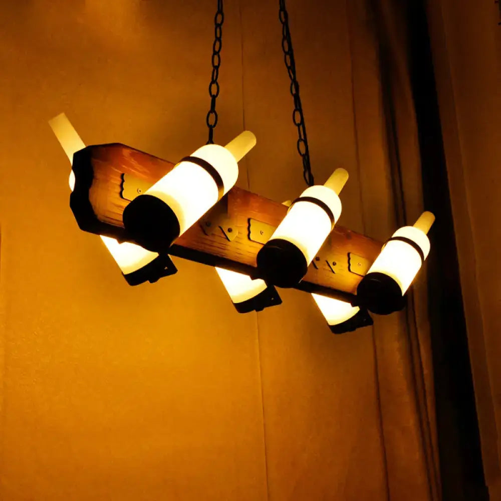 Rustic wooden island lamp with brown wood arm and frosted white amber glass lights suspended by black chains