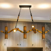 Decorbites 10-light metal brown island lighting fixture with rustic bamboo chandelier arms and brass accents