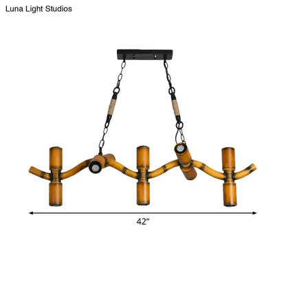 Rustic decorbites metal brown island lighting fixture with amber bamboo tubes and black metal ceiling mount chains