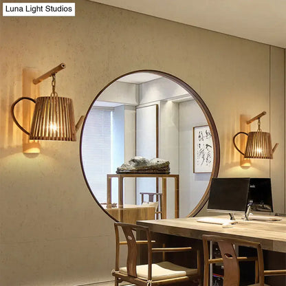 Rustic woven bamboo cylinder house sconce light fixture shaped like a teapot with warm ambient glow for bedroom walls
