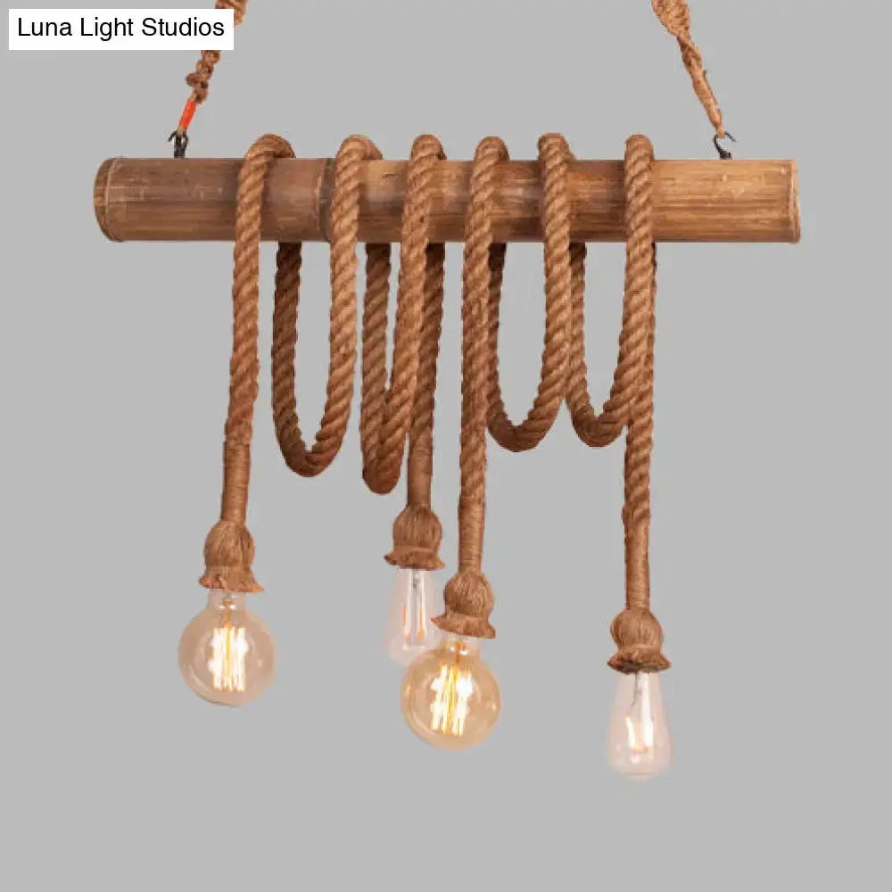 Rustic wooden beam adjustable rope island light with beige thick rope and clear filament bulbs hanging from bamboo rod