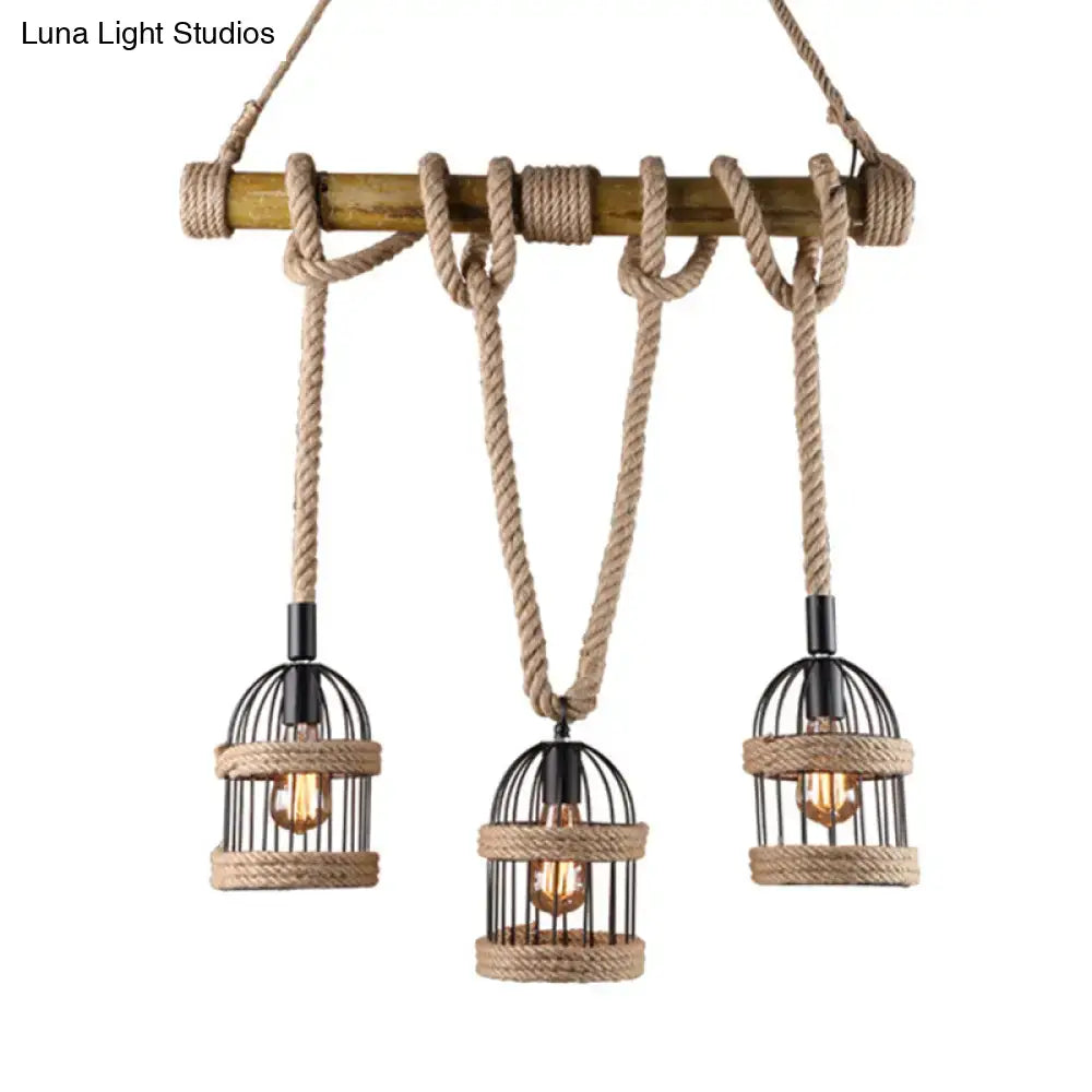 Rustic DecorBites Farm birdcage ceiling light with three black metal cages and jute rope cord hanging from wooden beam