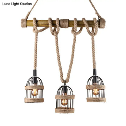 Rustic DecorBites Farm birdcage ceiling light with three black metal cages and jute rope cord hanging from wooden beam