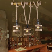 Decorbites farm birdcage island lamp is a 3-light ceiling light with black metal frames and beige jute rope cord suspension