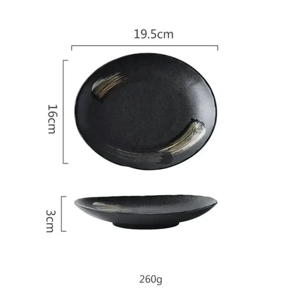 Rustic black ceramic sushi plate with subtle gold brushstroke accents for elegant dining decorbites black ceramic