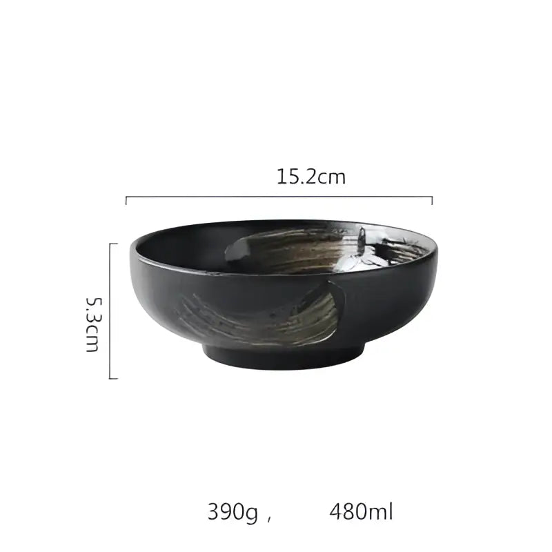 Rustic black ceramic sushi plate and bowl set featuring a black ceramic bowl with glossy finish and greenish brushstroke decorbites black ceramic