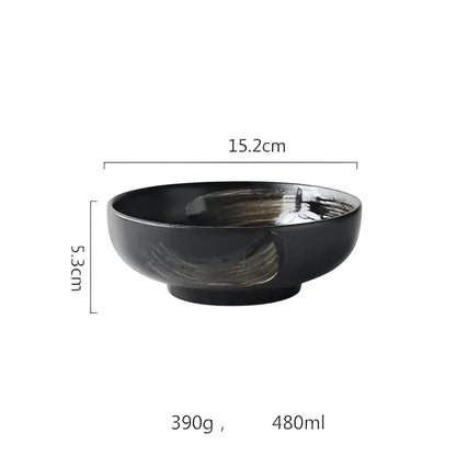 Rustic black ceramic sushi plate and bowl set featuring a black ceramic bowl with glossy finish and greenish brushstroke decorbites black ceramic