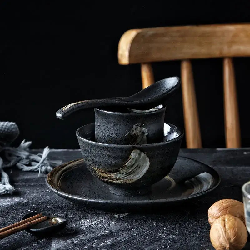 Stylish black ceramic sushi plate and bowl set with rustic handcrafted finish and subtle white brushstroke decorbites black ceramic