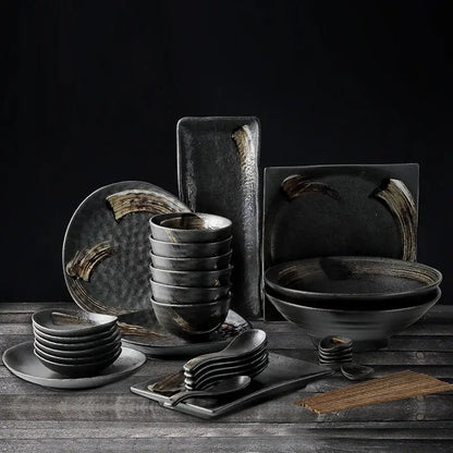 Dark gray decorbites black ceramic sushi plate and bowl set with rustic hand-painted gold brushstroke accents