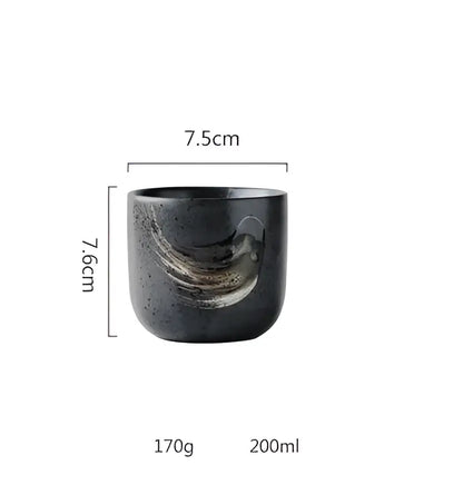 Rustic black ceramic sushi bowl with subtle swirling metallic gold accent for elegant dining decorbites black ceramic