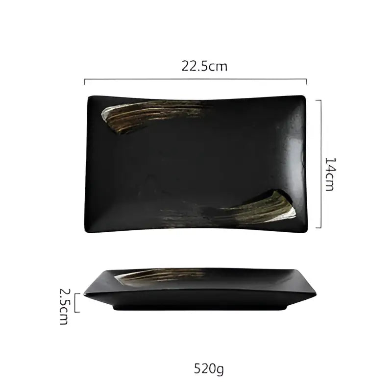 Rustic black ceramic sushi plate with gold brushstroke accents from decorbites black ceramic dining set