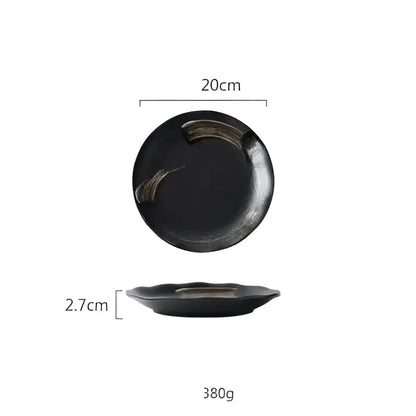 Rustic black ceramic sushi plate with glossy finish and subtle gold brushstroke design for dining decorbites black ceramic