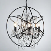 Black wrought iron chandelier pendant with clear crystal deco droplets and candle-style bulbs for restaurant decor