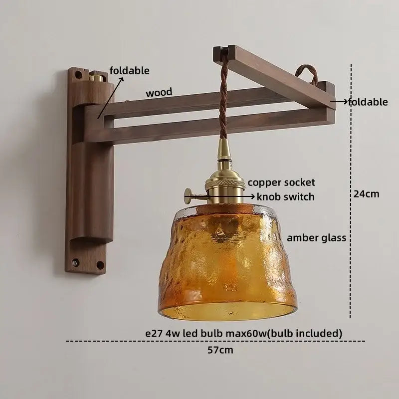 Rustic brass wall sconce with foldable wooden arm and decorbites clear glass amber shade for elegant stair lighting
