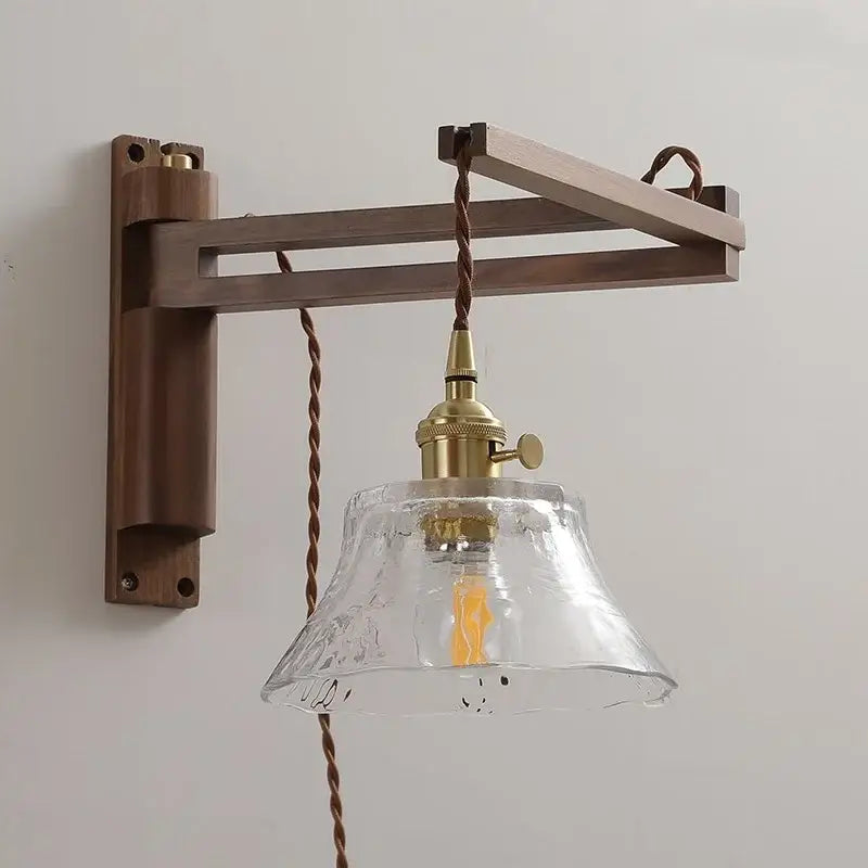 Rustic brass and clear glass wall sconce with dark wood bracket and textured clear glass for decorbites clear glass stair light fixture