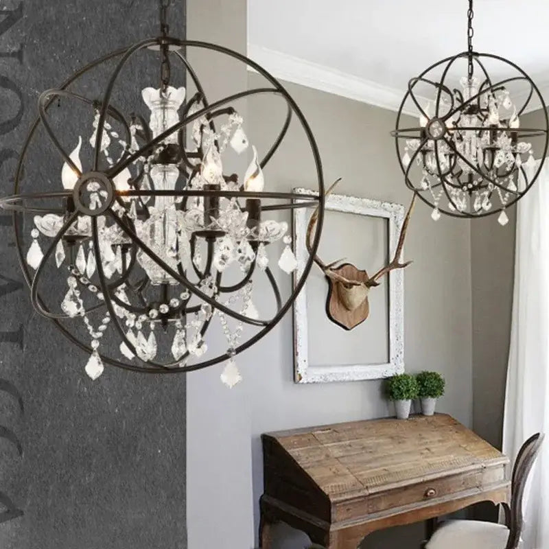 Rustic bronze crystal earth birdcage chandelier with black wrought iron spherical frame and dangling crystal droplets