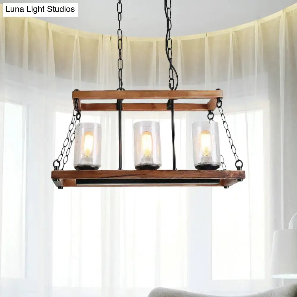 Rustic brown seeded glass island light with three 110v-120v 220v-240v candle bulbs and wooden trapezoid guard