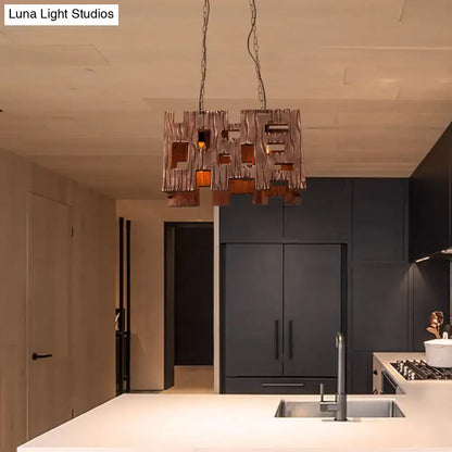 Rustic copper rectangular restaurant island chandelier with copper-toned geometric design and amber glass accents