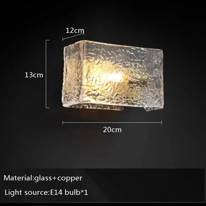 Rustic dark brown glass wall sconce lamp with clear textured glass and copper base for living room decor