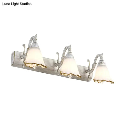 Rustic distressed white metal wall light with three frosted glass scalloped shades and gold trim 110v-120v