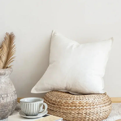 White linen throw pillow cover with soft textured surface and linen fringed pillow design for rustic earthy tones decorbites