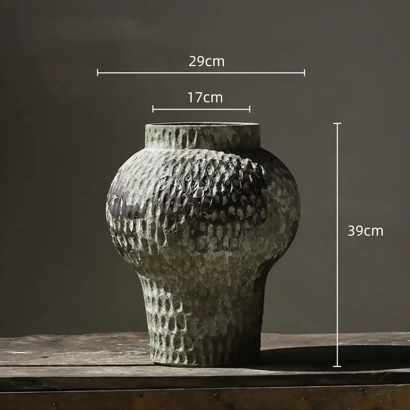 Rustic gray and white coarse pottery vase with textured matte gray hammered pattern for home decor by decorbites