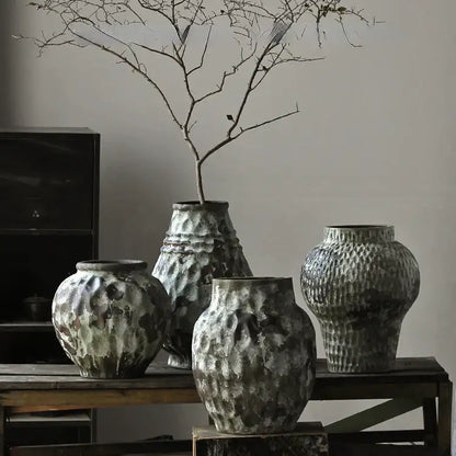 Four rustic gray and white coarse pottery vases with hammered finish ideal for decorbites coarse pottery home decor