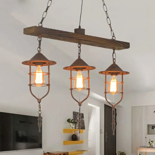 DecorBites™ caged rustic metal pendant light fixture with three exposed edison bulbs and wooden beam suspension