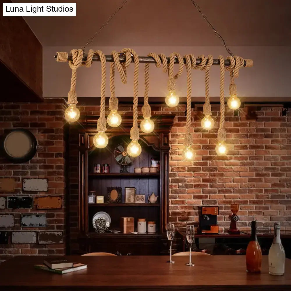 Rustic nautical-style decorbites farmhouse exposed bulb pendant light with dark wood hemp rope and glowing edison bulbs