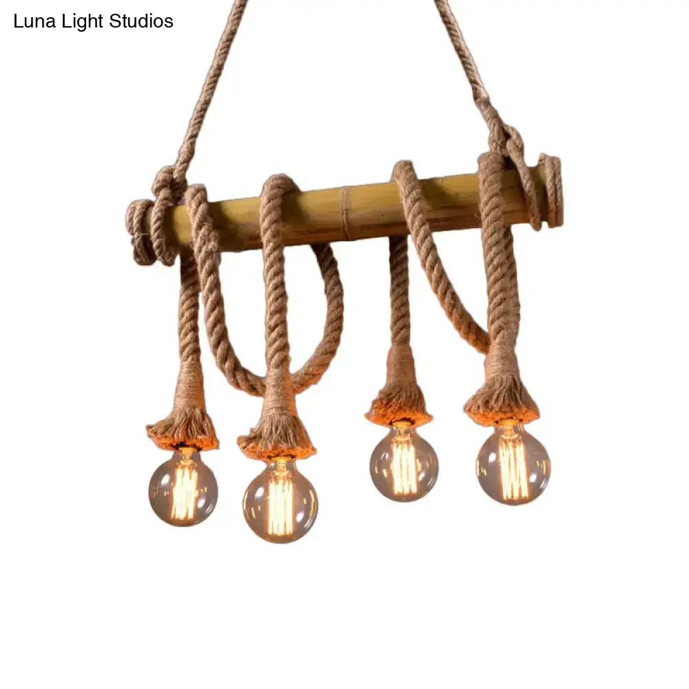 Rustic beige bamboo island light with thick natural rope suspension and four glowing filament bulbs by decorbites