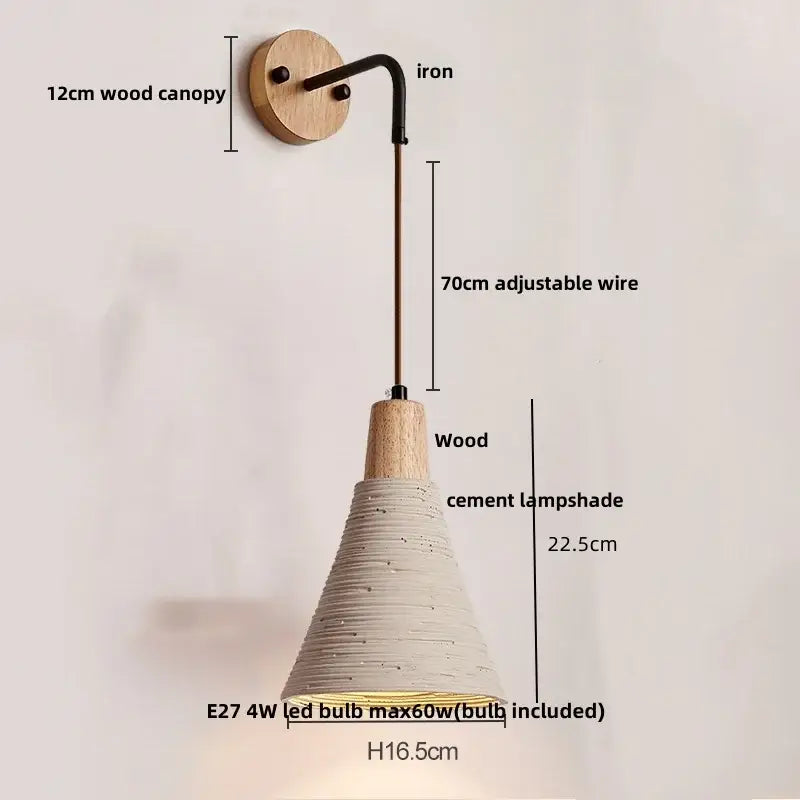 Rustic moon cement led wall lamp with a natural wood base, black iron arm, and off-white textured cement shade decorbites cement led