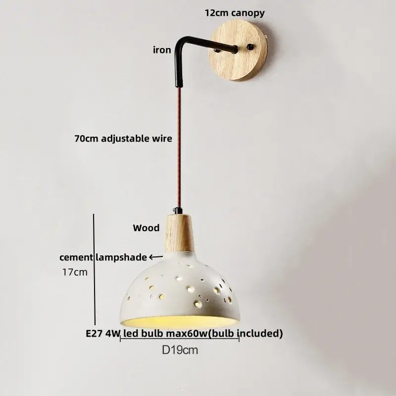 Rustic moon cement led wall lamp with white ceramic perforated shade, wooden canopy, and iron arm for bedroom decorbites cement led