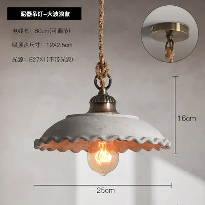 Rustic off white ceramic pendant light with scalloped edge brass hardware and twisted rope suspension cement loft style