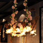 DecorBites™ rustic lantern pendant light with wooden frame pink flowers and six warm lantern-style lights for island lighting
