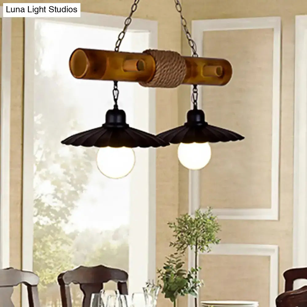 Rustic wooden barrel scalloped hanging lamp with black metal shades and rope accents for dining room lighting