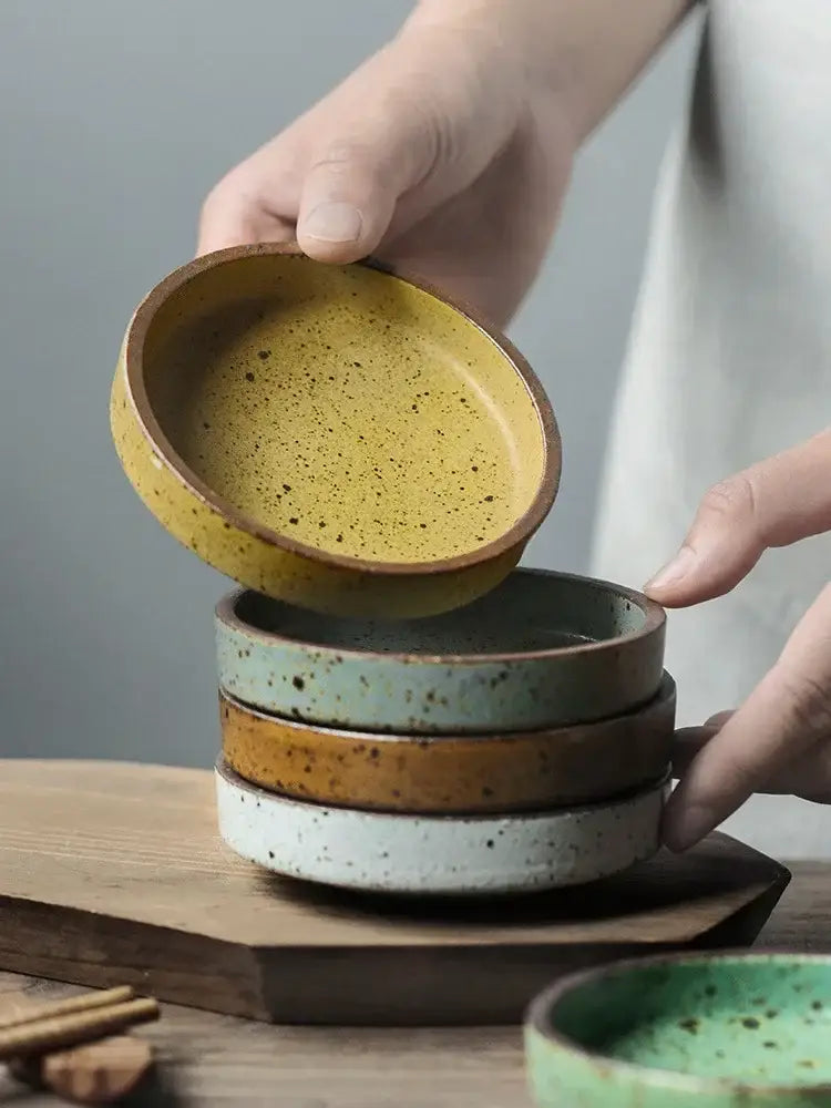 Rustic speckled ceramic sauce dishes with earthy tones and uneven edges by decorbites ceramic sauce