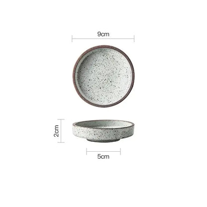 Rustic speckled ceramic sauce dishes with a dark brown rim featuring a matte finish from decorbites ceramic sauce collection