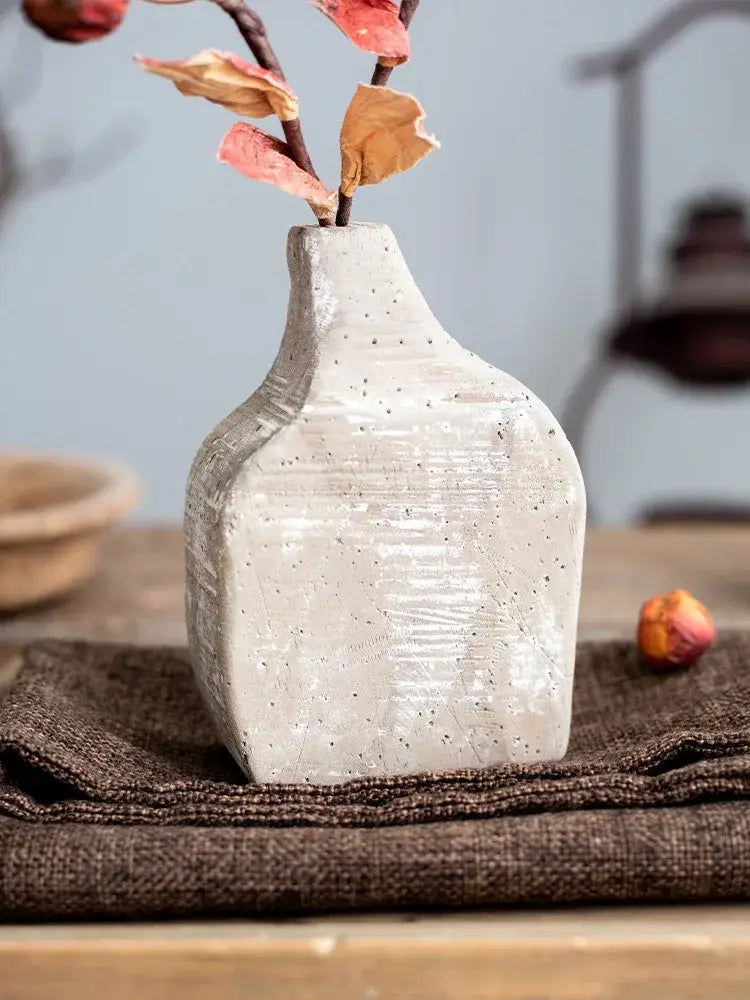 Rustic speckled gray hydroponic vase with textured off-white ceramic and subtle striations for garden rattan decorbites hydroponic vases
