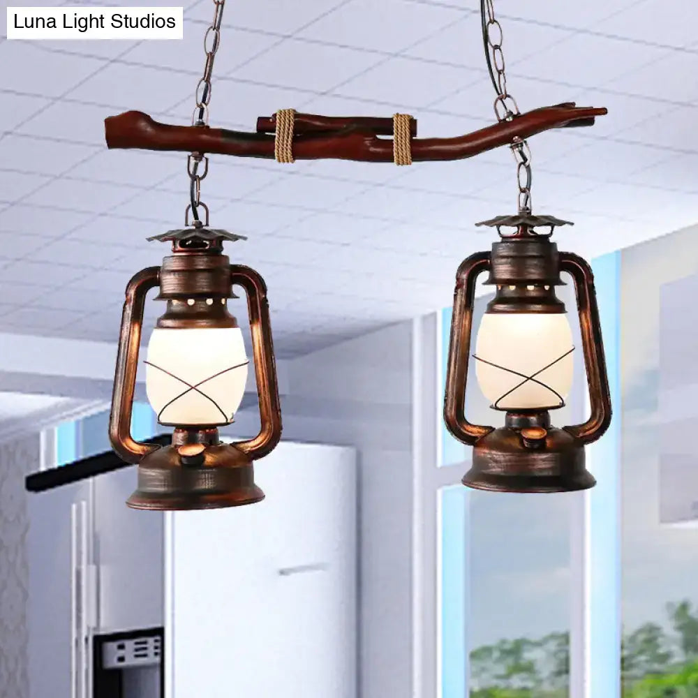 DecorBites™ vintage aged copper 2-light lantern island pendant with frosted glass globes and x-shaped wire design