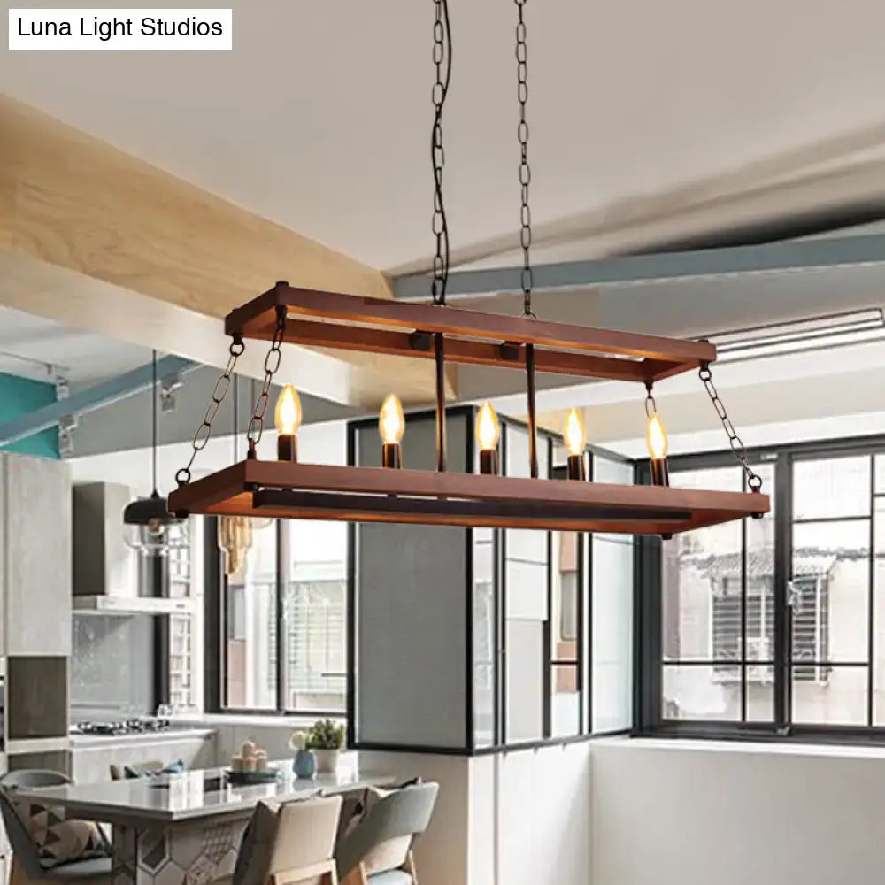 Rustic vintage brown wood chandelier with warm wooden frame black metal chains and five exposed filament bulbs for dining room island light