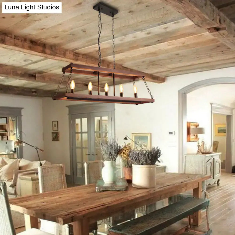Rustic vintage brown wood chandelier with five exposed bulbs and dark metal chains for dining room island lighting