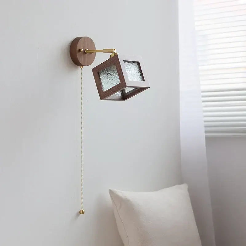 Minimalist rustic walnut wood and brass wall sconce with dark wood frame and frosted glass panels for bathroom decorbites led light
